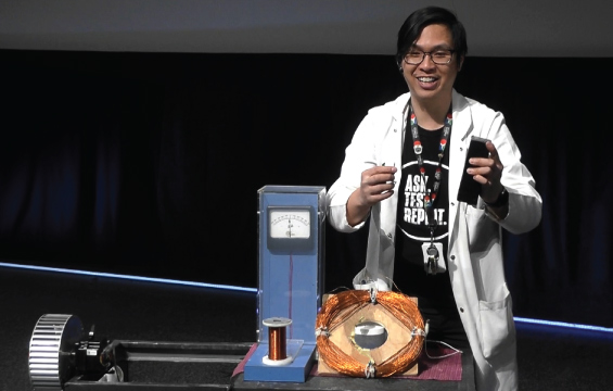 An educator presents an energy demonstration.